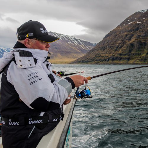 Fisher and view of fjord in Iceland © Michael Schuwirth
